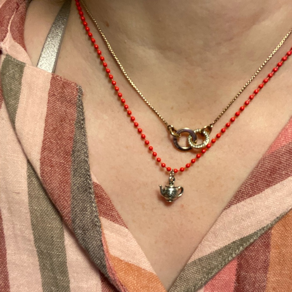 Whimsical ☕️ 🫖 charm on red metal :)
